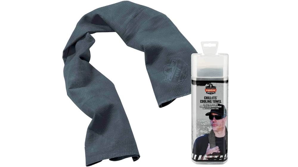 A grey cooling towel shown next to the plastic packaging with a mans face on it.