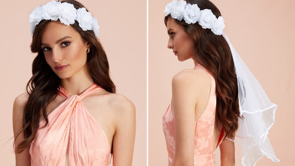 brunette model in peach dress wearing boho veil with white flower band 