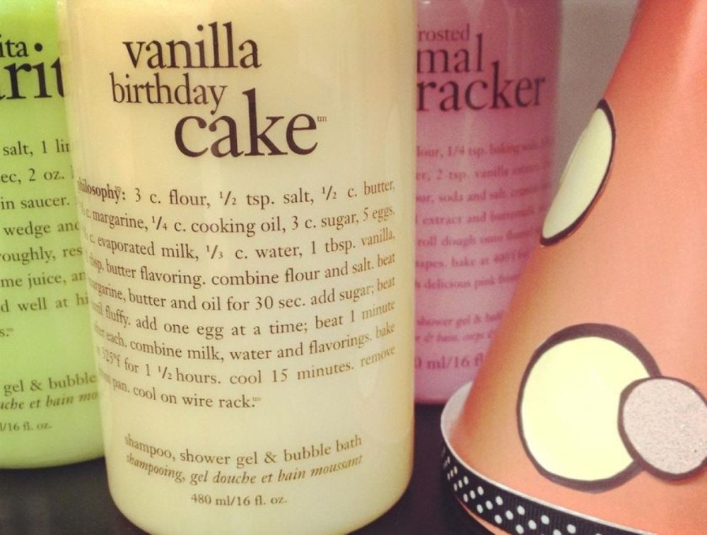 A bottle of Vanilla Birthday Cake shampoo, shower gel, and bubble bath.