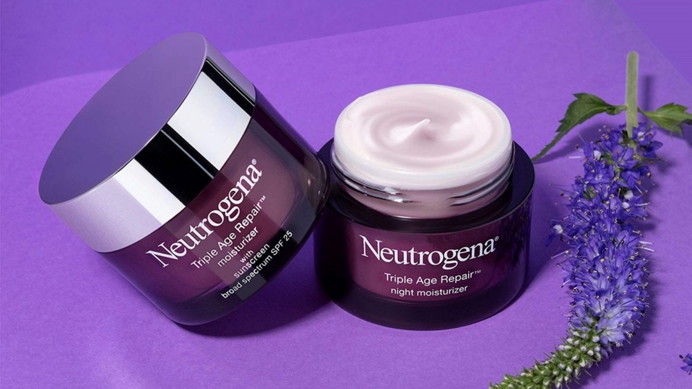 Two jars of Neutrogena Triple Age Repair Moisturizer.