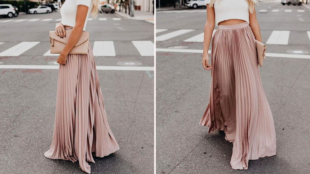 Blonde woman wearing blush-colored maxi skirt and white crop top