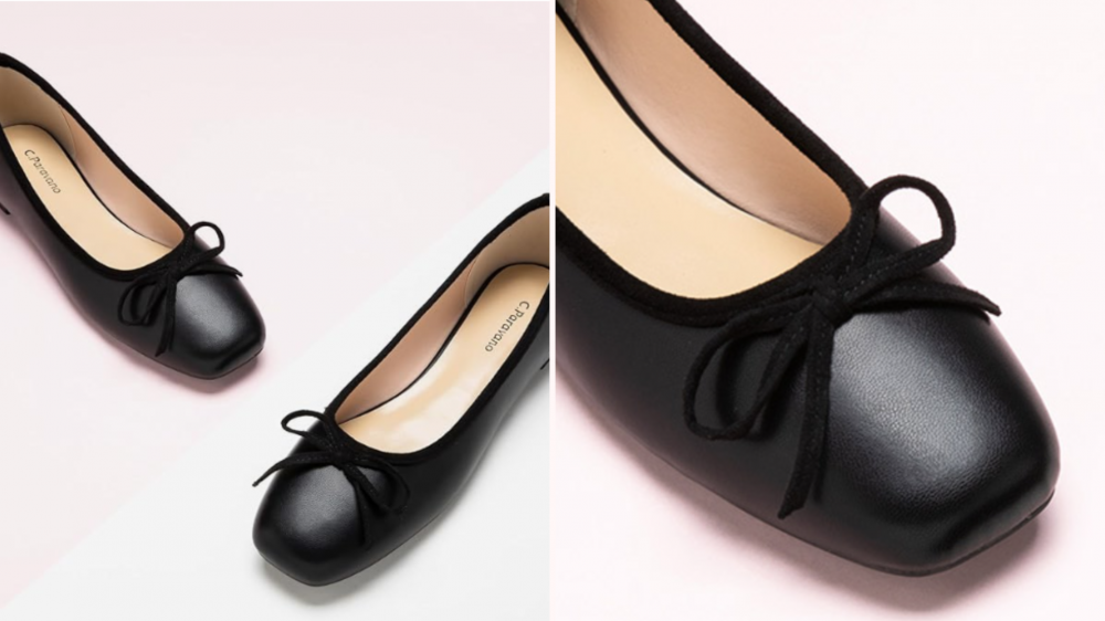 Black C-Paravano ballet flats with a bow on the toe.